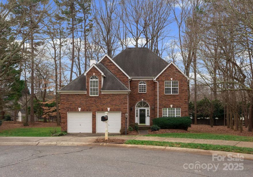 Beautiful brick home with a grand two-story foyer, ideally positioned in one of Matthews’ most sought-after locations—just a short walk to downtown Matthews and everything the area has to offer. Enjoy being directly across from Squirrel Lake Park and minutes from fitness centers, all while tucked away on a large, private cul-de-sac lot. Inside, formal living and dining rooms with decorative round columns create a welcoming first impression. The living room offers incredible flexibility and can easily serve as a home office, playroom, or additional gathering space. The spacious family room opens to the kitchen, making it perfect for everyday living and hosting memorable family gatherings. A bright breakfast nook with a bay window overlooks the beautiful backyard. The expansive primary suite features a sitting area and an updated primary bath, providing a peaceful retreat after a long day. Brand new carpet and fresh paint throughout, plus a new water heater, allow buyers to move in with confidence. Lovingly and meticulously maintained by the same owners for over 20 years, this home is move-in ready with incredible potential for future upgrades. The private backyard is ideal for entertaining and even offers plenty of space for a future pool. Optional HOA is only $5 per month. Don’t miss your opportunity to own an amazing home in one of Matthews’ most desirable locations.
