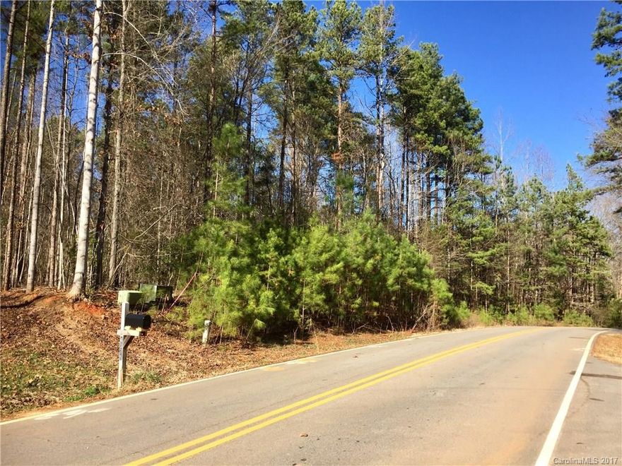 Georgeous wooded lot nestled in the beautiful Coves at River Oaks.  Seasonal water views and walking trails to enjoy the hardwood and nature. Build your dream home here! Lower York Co taxes and in the Clover school district. Tucked away but conveniently located just minutes from shopping and restaurants in Lake Wylie and/or Belmont.
Please verify school assignment for upcoming 2017-2018 school year.
Seller requires pre-approval letter or proof of funds with offer.