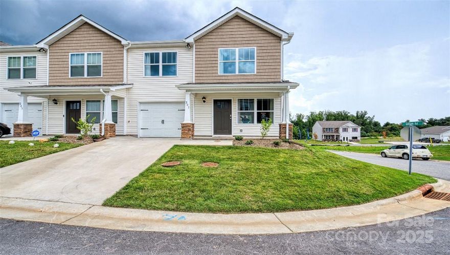 Wildbrook Village, a new community nestled just beyond the borders of Maggie Valley. Minutes from downtown Waynesville with a lively Main Street that has many local restaurants to choose from and charming stores for shopping. This 3 bedroom, 2.5 bath townhome offers a seamless blend of style and functionality. The kitchen has beautiful countertops, tile backsplash, shaker cabinets and stainless-steel appliances. Revwood flooring throughout the main level adds elegance and warmth to the home. *Home features are subject to change without notice. Internet service not included. Sq footages are approximate*