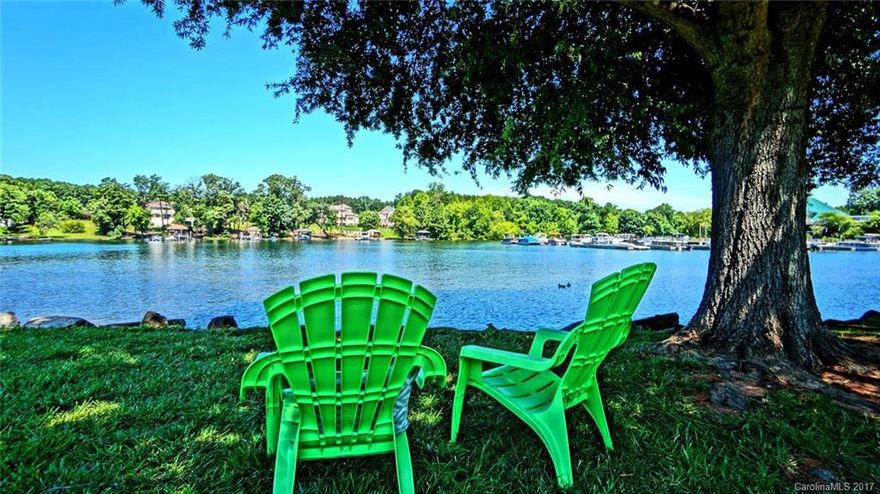 Waterfront PENTHOUSE End Unit with an Elevator! Updated 2BR/2BA condo with SS appliances, new granite, tile backsplash, lighting, marble flooring, stone accent wall, ceiling fans & new hardware & faucets. Nothing else left to do but put your clothes in the closets & enjoy lake living at its best! Master bedroom & living room offer views of the lake. Covered deck lets you enjoy the view of Lake Norman all year round. Stroll the boardwalk or walk to area restaurants & shopping.