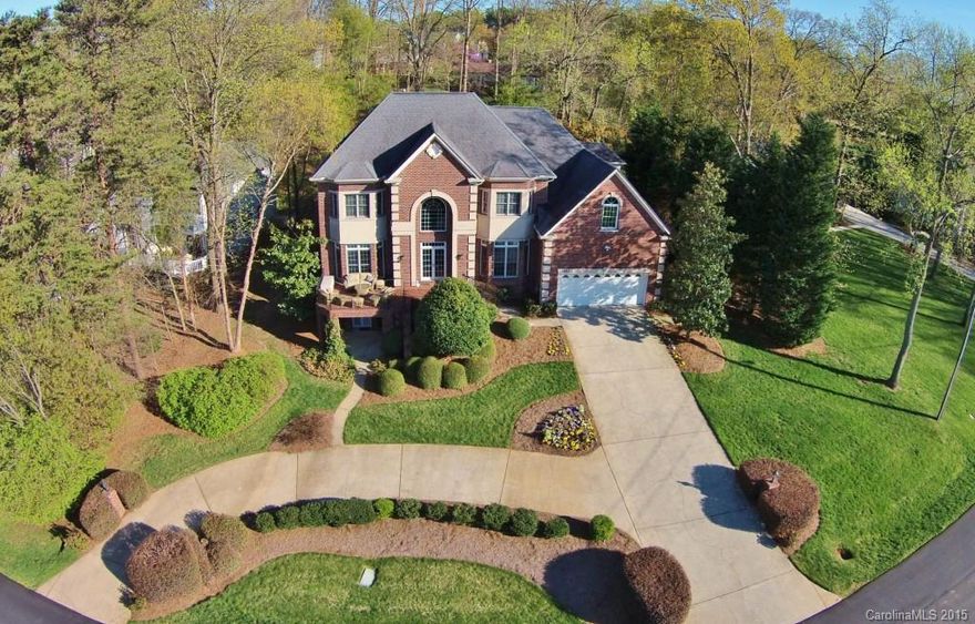 LOCATION LOCATION LOCATION! Full brick home w/spectacular views of Lake Norman & lake access!!Grand foyer & 2 story great room,chef's kitchen w/Thermador gas cooktop,granite,tile floors & backsplash.Renovated master bath, interior just painted,upstairs AC replaced.HUGE walk out basement w/billiard rm,wet bar,media & exercise area. Large private backyard w/deck.NO HOA! Seller offering 1 year of boat storage paid at marina in Cornelius!Also Home Warranty! Enjoy Lake living just in time for summer!