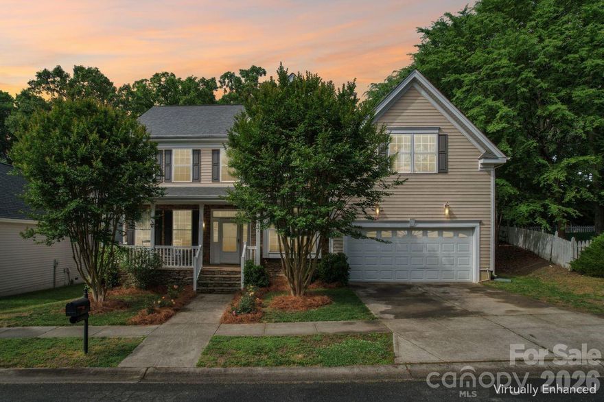 From the moment you arrive, this beautiful home in sought-after Riverbend welcomes you with a charming stone-accented front porch—perfect for slow mornings and relaxed evenings.

Inside, natural light fills the space, highlighting hardwood floors and soaring ceilings. The thoughtfully designed layout offers four spacious bedrooms, a main-level office or flex space, and both front and rear staircases for added flow and functionality.

The open-concept kitchen is ideal for everyday living and entertaining, featuring a large island, maple cabinetry, pantry, built-in desk, and solid surface countertops, along with newer stainless steel appliances—including an induction range and French door refrigerator, both less than a year old. It overlooks a stunning two-story great room with a gas fireplace.

Step outside to an expansive deck and fully fenced backyard backing to a wooded area, offering privacy and a peaceful setting.

Upstairs, the oversized primary suite provides a true retreat with a private sitting area, dual closets, and a spa-like bath with soaking tub and separate shower.

Updates include Gas Water Heater (2025), Attic Insulation (2024),  New Samsung Bespoke Induction Range (2024) and LG 28 Cu.Ft. 3 Door French Door Refrigerator (2024)

Located near Mountain Island Lake, Riverbend offers a vibrant community lifestyle with a swim club, playgrounds, trails, and convenient access to shopping, dining, and Uptown.

Blending light-filled spaces, comfort, and inviting outdoor living, this home is a standout in one of the area’s most desirable neighborhoods.
