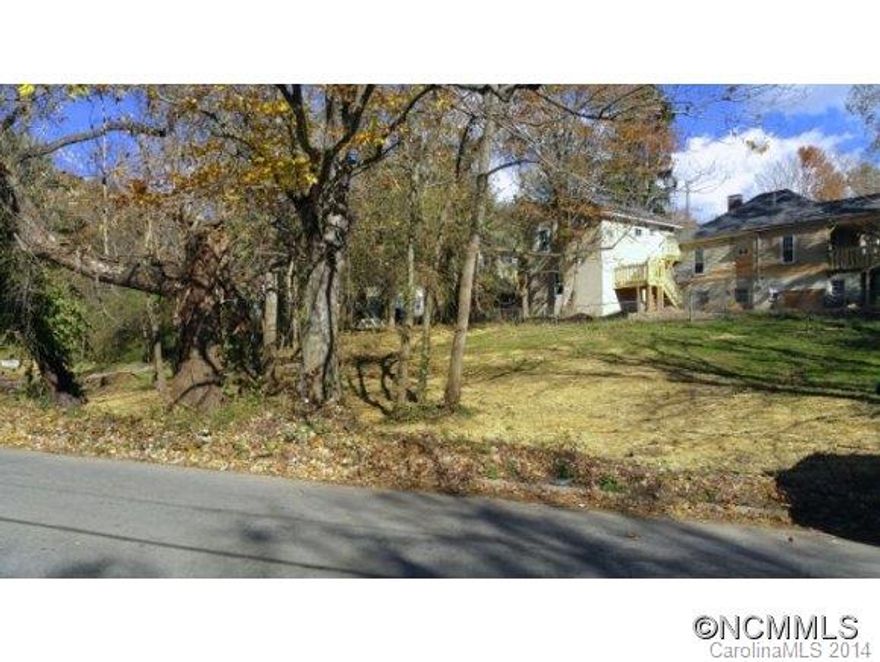 Buildable lot less than 1 mile from Haywood Rd and the heart of west Asheville. Lot is subdivided portion of PIN listed above.  Taxes TBD. See attachment for summary of RM-8 zoning guidelines.