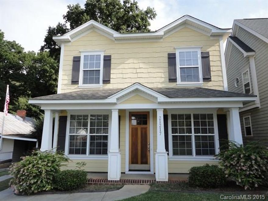 3 bedroom 2.5 bath charming home with inviting porch in downtown Cornelius on top off all local amenities! Has large bright windows, formal dining room w/ hardwood floors, great room with ceiling fan and gas log fireplace, neutral colors. Kitchen has pantry, matching appliances, and light oak cabinets. Master suite has walk in closet, oversized tub and plenty of counter space. Home walking distance from shops!