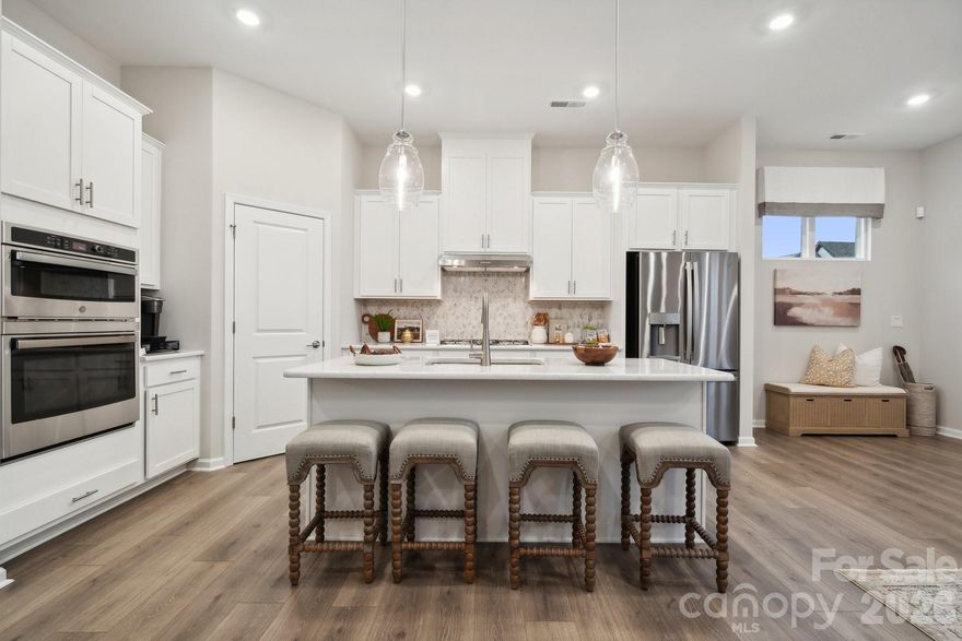 What's Special: Covered Patio | End Unit | Gourmet Kitchen | Corner Lot. New Construction - May Completion! Built by America's Most Trusted Home Builder. Welcome to the Avon at 8679 Miles Gap Road in Ridge at Sugar Creek! This stunning new end-unit townhome welcomes you with a bright foyer that opens into an easygoing, open-concept layout. The great room, gourmet kitchen with a center island and walk-in pantry, and casual dining area all flow together to create a warm and airy main living space. Just beyond, you’ll find a convenient half bath, a covered outdoor living area, and a two-car rear garage. Upstairs, a spacious loft with a nearby tech space gives you room to work or unwind. Two secondary bedrooms with walk-in closets share a full bath, while the primary suite offers its own en-suite bath and large walk-in closet. The laundry is thoughtfully located on the second floor for added convenience. Pool and cabana now open! Ridge at Sugar Creek in Indian Land, SC, offers a welcoming lifestyle with a new pool and planned greenway trail. Just 4.5 miles from Ballantyne, you’ll enjoy easy access to I-77, I-485, and the Ballantyne Bowl’s dining and events. Commuting is simple with quick routes to Uptown Charlotte and Ballantyne Corporate Park. Additional Highlights Include: gourmet kitchen, extended laminate flooring at great room, and ledge at primary shower. Photos are for representative purposes only. MLS#4351792