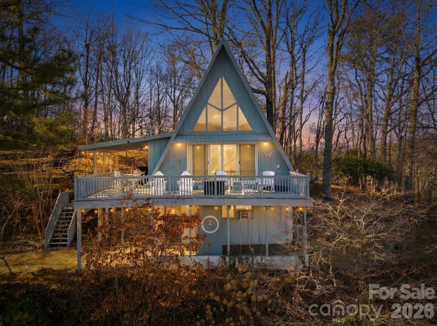 ***Seller motivated!*** Perched at 3,292 ft elevation, this fully furnished 4BR/2BA mountain retreat offers incredible long-range views and is currently operating as a successful short-term rental. Move-in ready with a metal roof installed in 2017 and minimal restrictions for continued rental flexibility. Conveniently located just 15 minutes from Franklin and 19 minutes from Dillsboro, offering easy access to dining, shopping, and outdoor adventure.
