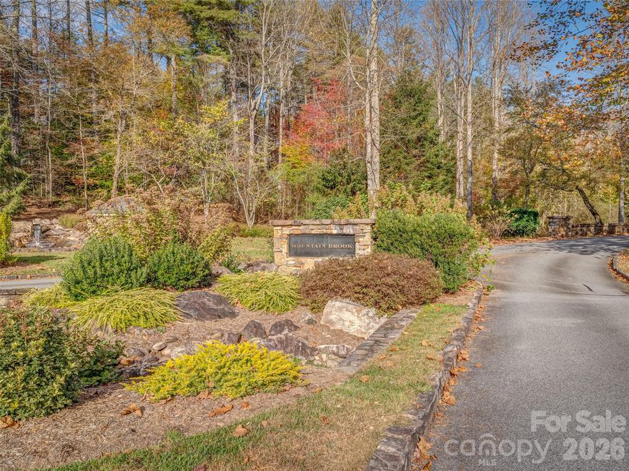 Mountain Brook Community is approximately 2.5 miles from Downtown Brevard. Very desirable Gently Sloped, private, easy buildable lot. Mountain Brook is one of Brevard's finest residential communities featuring beautiful landscape and quality mountain style homes. Come check it out ! Schedule your showing today!