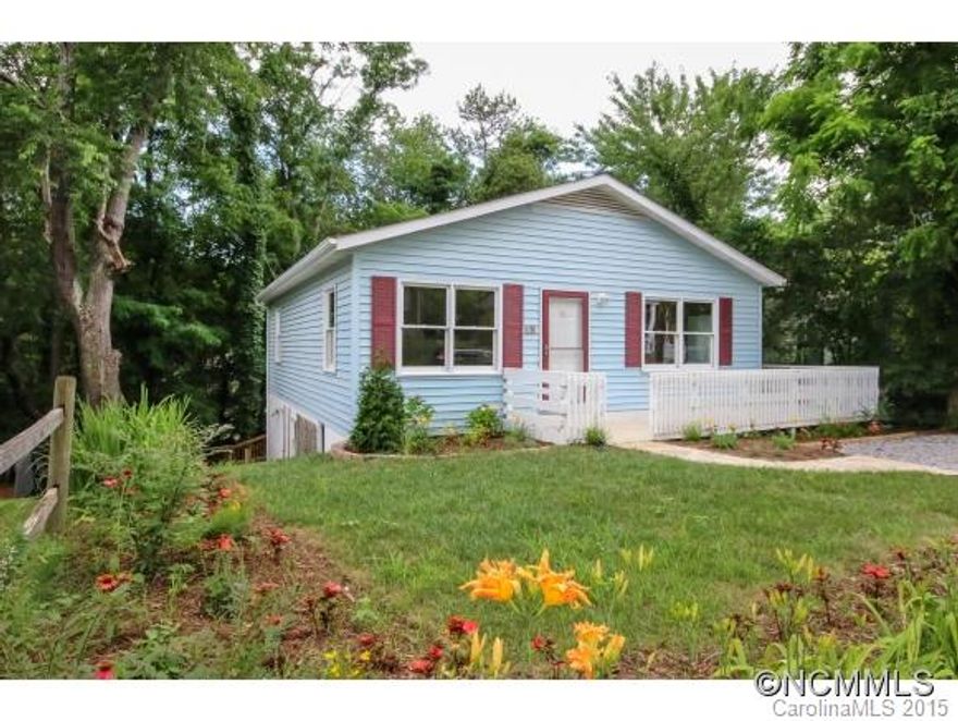 West Asheville remodel! Excellent location and move in ready! Walk to both Haywood Rd and park at end of Vermont St.  Brand new kitchen with granite counter tops and new cabinets, new floors throughout, and fresh paint! 2 bedrooms upstairs, 1 downstairs. Semi-private fenced-in and terraced backyard with spacious stone patio. Workshop and extra storage in partial unfinished basement. Room to park 2 cars off street.