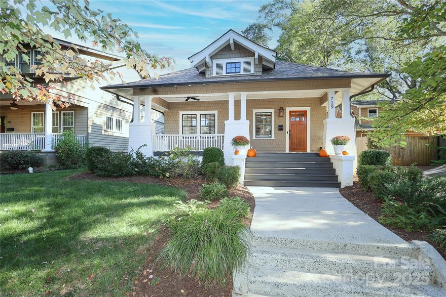 Welcome home to 719 E Tremont, located in the historic district of Dilworth. Enjoy the beautiful covered porch with a gas lantern, perfect for watching neighbors stroll along the tree-lined streets. This charming and fully updated bungalow features 4 bedrooms and 2.5 bathrooms. The spacious primary suite is located on the main level and includes a large bathroom and an even larger walk-in closet with custom shelving.

The kitchen boasts a generous island and commercial-style stainless steel appliances, with an open-concept layout ideal for hosting and entertaining. The main level offers two flexible living or dining spaces, along with a large mudroom and drop zone. Whether you're looking for formal areas or casual living, this home fits the bill.

Upstairs, you’ll find three additional bedrooms, a full bath, and a bonus space that can serve as an office, playroom, or oversized finished storage. Outdoor living is equally impressive, featuring a large covered parking area with storage, a rear covered porch with built-in kitchenette, and a custom cocktail pool. The low-maintenance backyard and ample parking make this an urban oasis.

Don’t miss the wine cellar — or the Dilworth speakeasy! The seller has made numerous upgrades including the pool, hardscaping, plantation shutters, new gas line, indoor/outdoor fireplace with tile surround, gutters, electric gate, professional basement waterproofing with new sump pump, and a water filtration system.

Super convenient location — just a couple blocks from dining, entertainment, and the light rail. Right in the heart of it all!