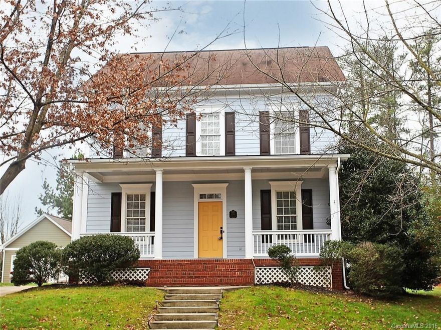 Fabulously Flowing Home with Beautiful Details and Lovely Level Yard! Charming Front Porch, Patio with Privacy fencing & backs to trees.  Rich hardwoods on main. Gourmet Kitchen w/ LG stainless appliances, granite, rich cabinetry, breakfast bar & pantry. Featuring: transom windows, wood blinds, columns, millwork, security. Large versatile Loft (Play/Reading Rm). Living Room or Study. Luxurious Master Suite with extensive gorgeous tile. Closets Galore! Close to I-77. Enjoy the Baxter amenities!