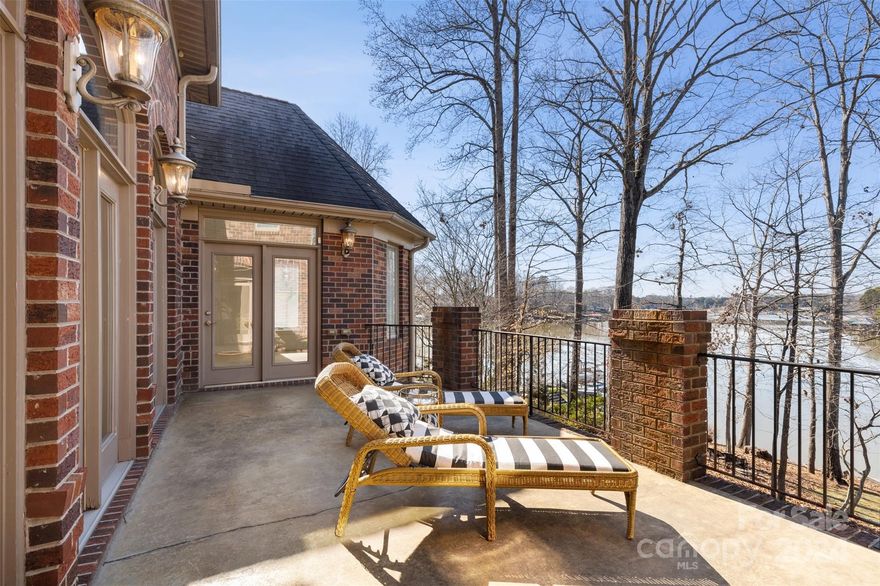 Hurry, this home is perfectly priced for you! Experience luxury lakeside living with this stunning 5-bedroom, 5-bathroom sanctuary nestled along the shores of Lake Norman. Marvel at captivating sunsets & embrace tranquility in a home that's a rare gem, awaiting your personal touch. Boasting 5,700+/- SF, including a fully finished walkout basement, this residence is meticulously crafted to cater to your every lifestyle need. Whether you love hosting grand gatherings or desire spacious living with Second Living Quarters, this property promises unparalleled comfort. Immerse yourself in vibrant lake life from your private floating dock, which includes a Pontoon Boat with an accepted offer, featuring 200 feet of pristine shoreline. Conveniently located near shopping, restaurants, I-77, and medical facilities, this residence offers both luxury and accessibility. Room for you to add a pool! Your dream lakeside lifestyle awaits – seize this exceptional opportunity!