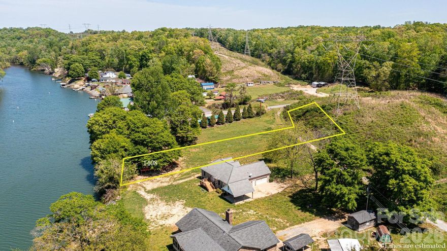 Waterfront lot available on Lake Wylie! Mostly cleared, level lot ready to build your new home! New flood zone requires any new construction to be raised due to flooding. Conveniently located near Hwy 16 & 485 for easy access to Uptown Charlotte and Airport! Adjacent Lot (1404 Hart Rd) also available for sale.