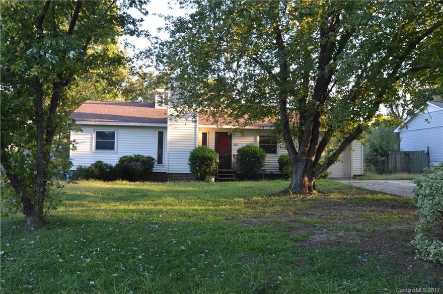 Cute home in the highly desirable Cramerton Mountain School District. Home has a new roof (June 2017), New Sliding Glass back door (June 2017), New Refinished deck (June 2017), New Vinyl Flooring in the kitchen, laundry and both bathrooms. Home features and beautiful stone to floor fireplace and a fully fenced back yard as well as a shed for additional storage. Home just needs a little cosmetic TLC and will be cute as a button. Perfect for 1st time home buyer!