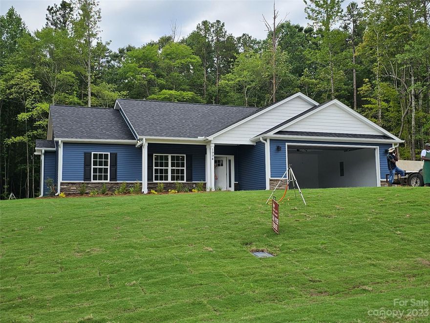 New Construction on 1.8 acres.  Home features 9 ft ceilings, open living/dining/kitchen. Split floor plan.  Garage is 24x24.  Screen porch off dining area.  Call today.
