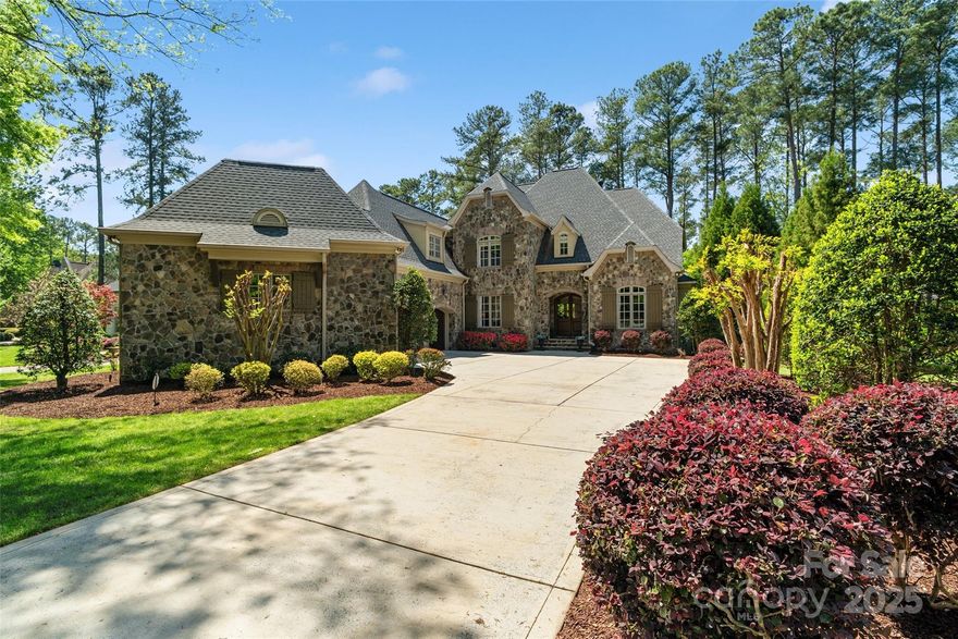 Tucked away in highly sought-after Highgate, this beautifully designed stone & stucco custom home sits on a quiet 1/2+ acre lot. The wall of windows fill the home with natural light, highlighting the open living spaces. Special touches like gleaming hardwoods on both levels, designer lighting, window treatments and upscale finishes throughout. The flexible floor plan includes a full bedroom and bath on the main level, a private office, and a convenient command center with drop zone and built-in desk. The spacious primary suite is a true haven, complete with a sitting area, luxurious bath and custom closet. Upstairs offers two additional ensuite bedrooms and media room with fireplace. Step outside to enjoy tiered outdoor entertaining areas, including a covered veranda with a vaulted ceiling & fireplace, plus a brick paver patio with built-in grill & fridge. The private, flat, fully fenced backyard is ideal for entertaining. Oversized 3-car garage with epoxy floors & built-in storage.