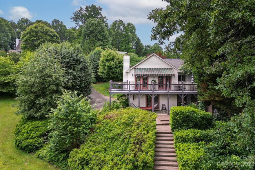 Welcome to a charming 3 bed / 2 bath home in coveted Laurel Pointe on Lake James in Nebo, NC. This delightful property offers direct lake access right from your own yard, complete with a boat slip! Imagine spending your days boating, fishing, or simply basking in the beauty of Lake James. Whether you're seeking adventure on the water or a peaceful retreat, this property offers it all. With a lake-facing deck, the house invites you to relax and unwind. Step outside into the private and maturely landscaped yard where you can enjoy the natural beauty that surrounds you. Nearby you'll find Lake James State Park and just across the water is the well-known Goat Island - a weekend favorite for the boaters! This home is a true gem, offering the perfect blend of comfort, natural beauty, and endless lake adventures. Schedule your showing today! Lake frontage for under a million won't last long!