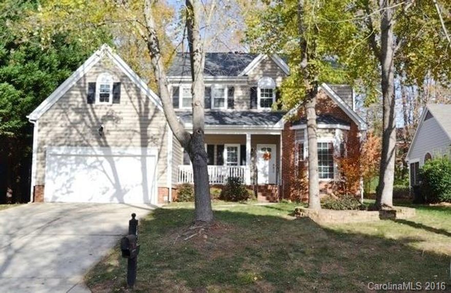 Amazing home, awesome price! Tons of living space in this beautiful home!  Formal dining and living, vaulted great room. Great kitchen has custom cabinets, built in desk, & farm style wood counter tops. Brand new hardwoods, subway tile backsplash, & fixtures. Deck lighting and brick patio in private back yard. Huge master and spacious bedrooms are located upstairs.  Neighborhood offers pool, tennis courts, and playground.  In the heart of the city with convenient access to the almost everything!