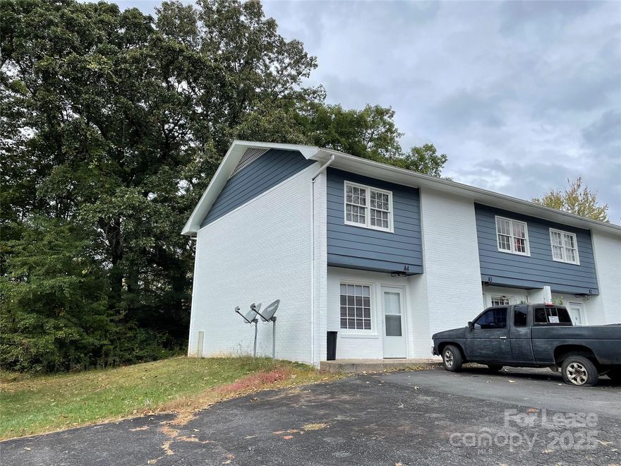 Two bedroom, one and a half bath townhome in Morganton. Downstairs includes living room with convenient half bath and spacious kitchen. Upstairs offers two large bedrooms and a full bath. Patio out back with storage closet. Plenty of parking available out front. *** Lawn care is included with rent. *** Home is pet friendly with pet rent of $25/pet per month. Please, no dangerous breeds.