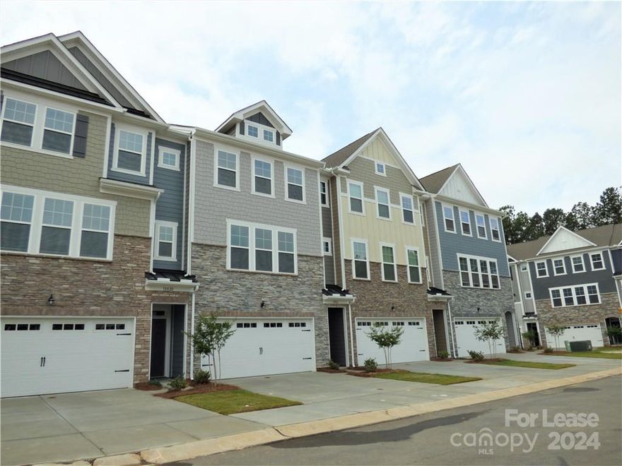 Absolutely stunning! From the moment you walk through the front door, you will be impressed! Freshly painted throughout and ready for you to call home today! First floor offers private guest suite complete with full bath. Second level offers gourmet kitchen with stainless steel appliances, double ovens, microwave, gas range, center island, Quartz countertops, subway tile backsplash & gorgeous cabinets; all open to dining room & spacious family room. Family Room has access to upper-level deck. Third floor offers Primary suite with walk-in closet, ensuite bathroom with dual vanities & oversized shower complete with bench. Two additional bedrooms complete this thoughtfully designed townhome! Quaint community with gathering area with bench area & firepit. Just minutes to local schools, easy access to interstate and all the many shops, restaurants and amenities the Ballantyne area has to offer! Approx: 30 minutes to the center of Uptown & Charlotte International Airport!  THIS IS IT!