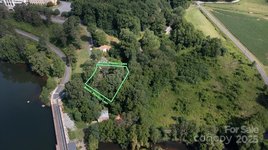 Rare opportunity to own a vacant lot in the highly sought-after Lake Junaluska Assembly! Just steps from the scenic walking trail that wraps around the lake, you'll enjoy the tranquil sound of nearby water all year long. Nestled in a vibrant lakeside community, you'll enjoy access to a range of amenities including golf, tennis, a cafe, a chapel, boating, parks, walking paths, and community events—all while being surrounded by mountain beauty.

Perfectly located just minutes from charming downtown Waynesville, Maggie Valley, Cataloochee Ski Area, the Great Smoky Mountains National Park, and only 25 minutes to Asheville, this is an ideal spot for a full-time residence or vacation home.