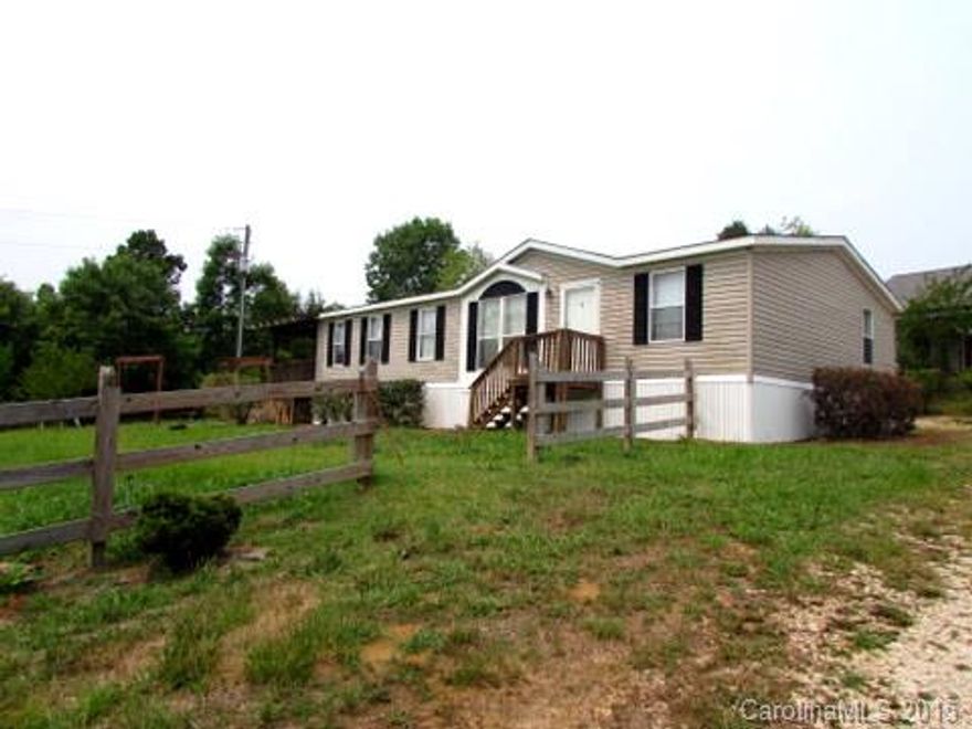 Endless opportunities! Come to the country and enjoy the peace, quiet & privacy this unique property offers.  Doublewide mobile home w/3 bedrooms, two baths, split bedroom plan, and covered porches. Separate unfinished home waiting for your final touches and huge barn/shop perfect for any direction or purpose. All this sitting on 10 acres of land perfect for horses, gardeners, or any type of nature enthusiasts.