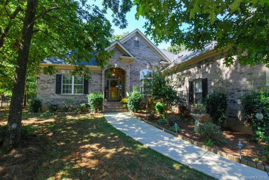 NEW PRICE! One of the few custom, full brick homes built by Edwards Builders on a 1/2 acre lot! Open, bright, immaculate and move-in ready, you will feel right at home as soon as you walk in. The view of the private fenced back yard is just beautiful! Gorgeous Kitchen with newer stainless appliances and tons of counter space, maple cabinets. Great floor plan with large master suite, walk-in closet, gorgeous master bath. You will love the tiled screened porch and huge patio! New Roof in 2013!