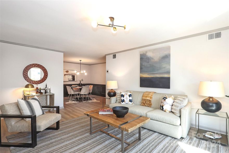 Location is prime for this rare newly renovated 3 bedroom condo with a modern design in Montford Park. New flooring, paint, light fixtures, hardware throughout. Most kitchen appliances are new. Plenty of natural light. The large primary bedroom suite boasts TWO walk-in closets with closet systems. The laundry room contains a new, full-sized washer/dryer, pantry shelving and easy access to the HVAC system. Franciscan Terrace features a large swimming pool adjacent to the Clubhouse and has recently added Google Fiber for high-speed Internet. With direct access, you can stroll or bike the newly completed section of the Little Sugar Creek Greenway-- a beautiful urban park which connects other parks, recreational facilities, shopping/dining areas, and gardens from uptown south to I 485. Park Road Shopping Center and the restaurants of Montford Dr are right around the corner. The light rail and LoSo are just minutes away.