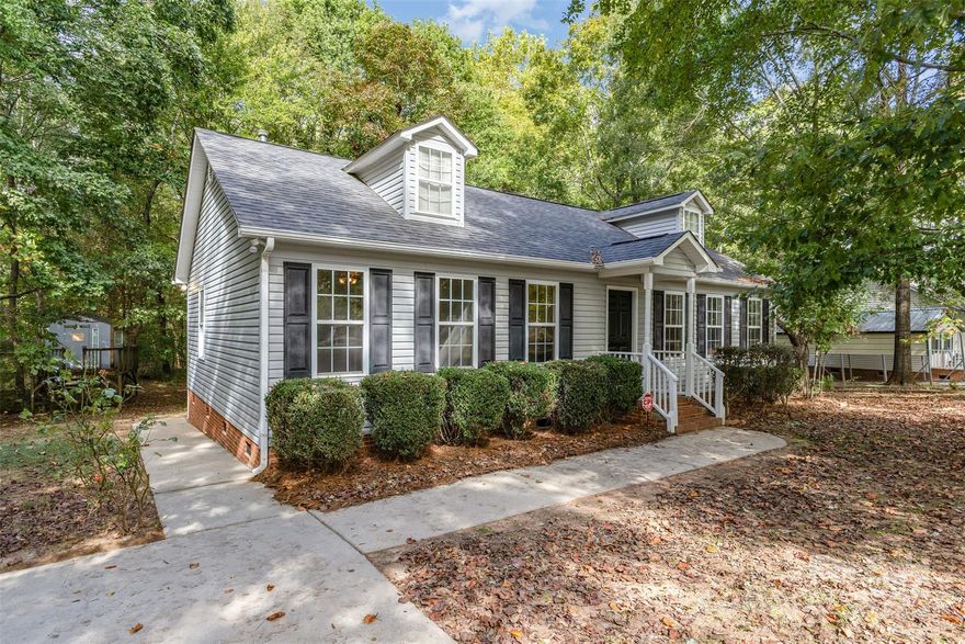 Welcome to 159 Scotch Pine Drive in charming York! This beautifully updated home features a desirable split-bedroom floor plan with three spacious bedrooms and two full bathrooms. Step inside to find brand-new luxury vinyl plank flooring and fresh paint throughout, creating a clean and modern feel. The kitchen offers a new stove and dishwasher, ready for your culinary creations. Enjoy peace of mind with major upgrades including a new roof installed in 2024 and a new water heater in 2025. Situated on a private, level, wooded lot, this home offers serene outdoor living with a back deck perfect for relaxing or entertaining. Best of all, there’s no HOA! Don’t miss your chance to own this move-in-ready gem.