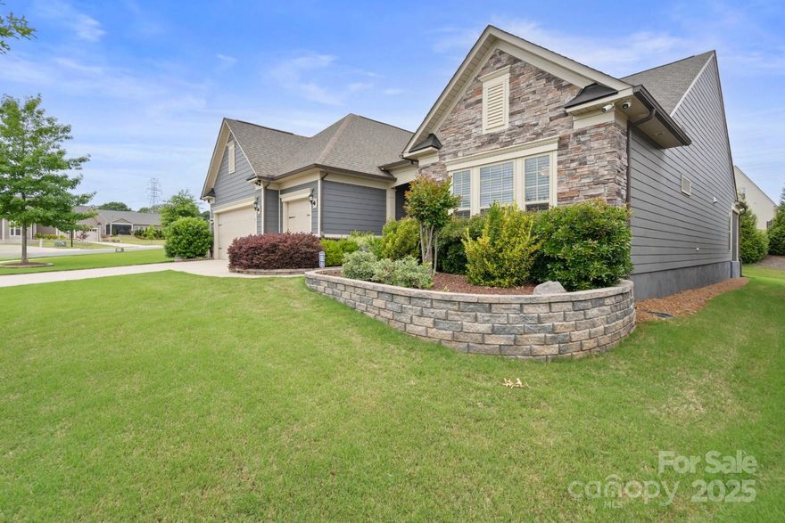 Welcome home to the highly sought after Dunwoody Way model. A true gem boasting spacious, open floor plan w/ numerous custom upgrades.  3 BR, 3 Full Bath. Entry Foyer. Dedicated Office w/French doors. Gourmet Kitchen, gas cooktop, direct vent hood, raised DW, island w/seating & pendant lights, Breakfast area. Great Rm w/gas FP. Sunroom leads out to Screened Porch & custom designed, raised stone patio overlooking private backyard. Extensive custom landscaping, irrigation. Laundry rm w/cabs, sink, drop zone. Upstairs you will find a large Loft area. 2 car, 4" ext.+ golf cart garage. Tankless HW heater. Pull down stairs to attic storage.  A 24 Hr. dedicated security system w/6 cameras, DVR + 2 TV's - ALL CONVEY. Amenities inc. full time activities director, pickleball, tennis, dog park. Amazing amenities + Fantastic location w/Anne Springs Greenway across the street - Shopping near by - easy access to Charlotte & the airport. Come join us in the Orchards - it's a great place to call home.