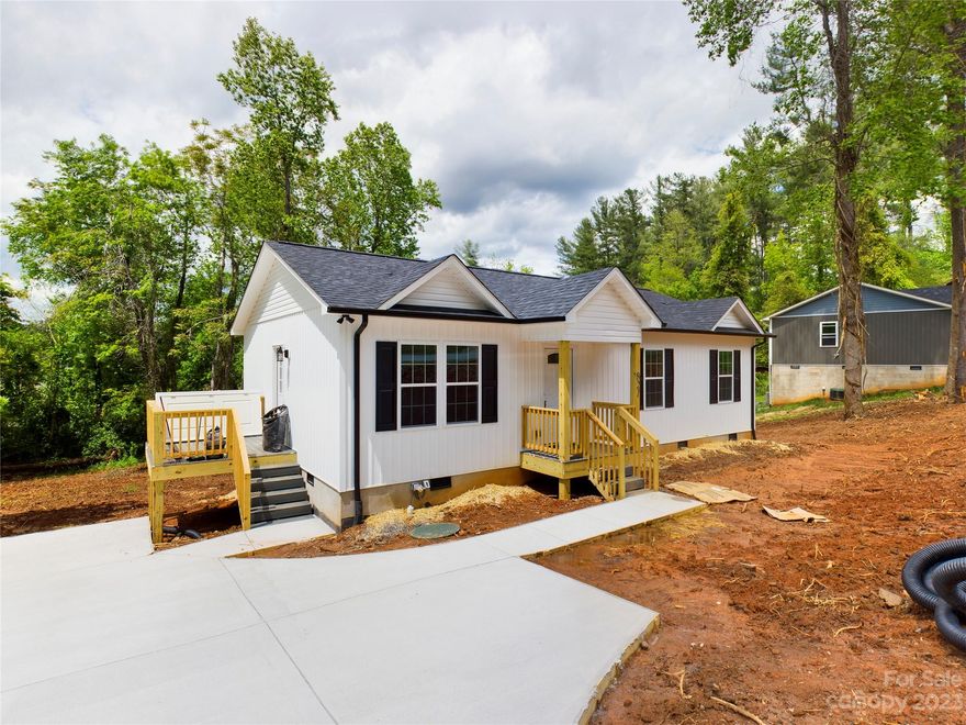 Location, Location, Location! This 3 Bedroom/2 Bath NEW CONSTRUCTION ranch home is less than 5 minutes from downtown Lenoir with many nearby parks including Mulberry Recreation Center, Lenoir Optimist Park, TH Broyhill Walking Park, and Lenoir Golf Course.  Super convenient to US 321 for a quick commute to the Hickory area or HWY 18 to Morganton or Wilkesboro.  Home features include granite counters, stainless appliances, custom cabinets including mobile island in the kitchen, durable and attractive LVP flooring throughout, 2 full baths, pre-wired for cable television and a concrete driveway.  1 year builder warranty included. Home is complete and ready to move in!