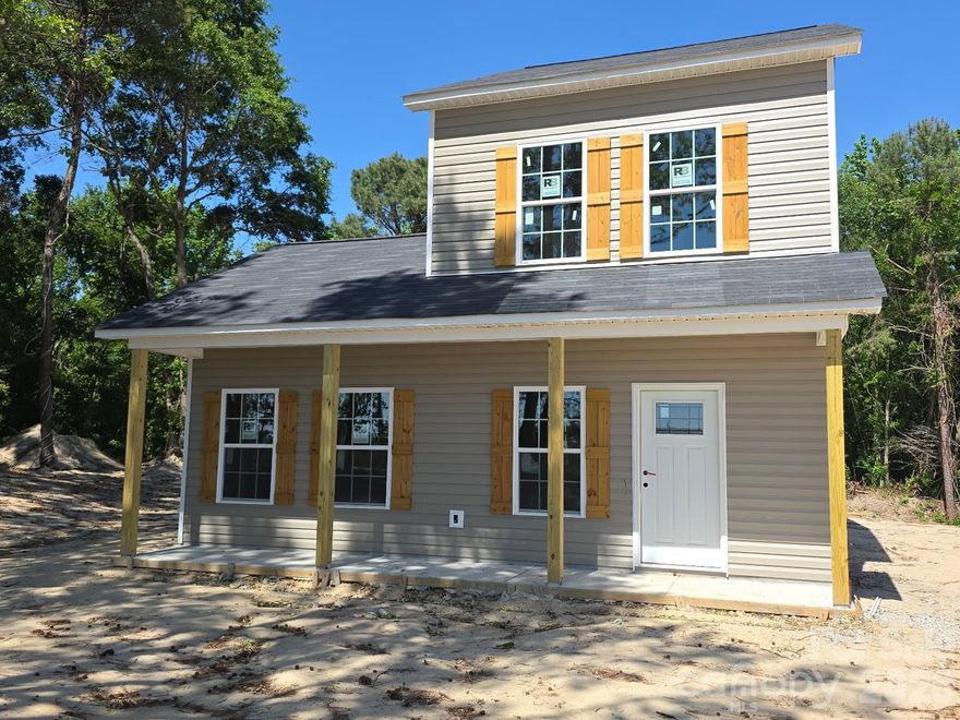 There is no wasted space in this proposed 1.5 story plan, located on a .50 acre lot.  The primary bedroom and bathroom are conveniently located on the first floor. The great room is adjacent to the eat in kitchen that leads to a rear patio and features wood cabinets, granite counters and vinyl plank flooring throughout. The upper floor features two bedrooms with carpet floor covering and full hall bathroom. If you are looking for new construction, with NO HOA fees, located in a rural area, but in reasonable proximity to Pageland area amenities, this one may be for you.
