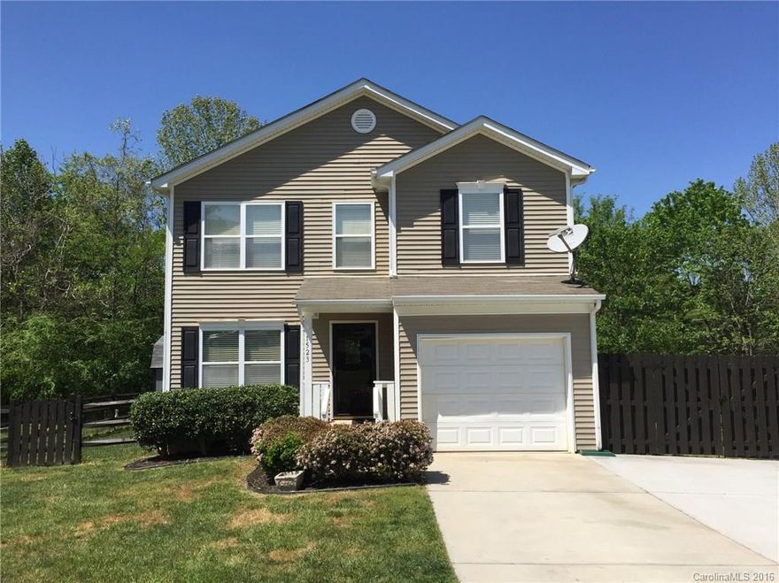 Spend your summer evenings strolling down the neighborhood path to the Statesville Greenway that runs just behind this home and coming back to relax on the newly refinished deck overlooking the woods just on the other side of your fenced yard.  No need to worry about updates or repairs on the weekends: stainless steel appliances, brand new high quality laminate floor, new carpet, fresh paint, drive way and home pressure washed, newly stained fence!  Oversized outbuilding!