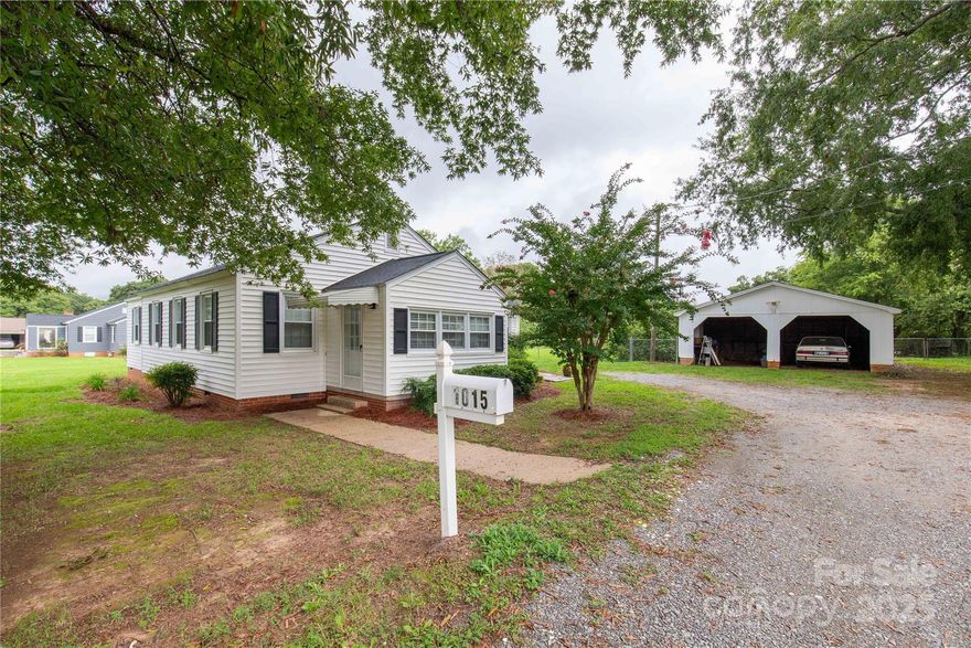 Welcome to this charming two-bedroom, two-bath home, perfectly situated on a spacious half-acre lot! This delightful 1,290 sq ft residence features a convenient Jack and Jill style bathroom, offering easy access from both bedrooms. Enjoy family meals in the cozy dining room, and make laundry day a breeze in the dedicated laundry/mud room. The home is move-in ready, with inviting spaces that are perfect for relaxation and entertaining. Outside, you’ll find a detached two-car building that includes ample workshop space, ideal for hobbies or extra storage. With its blend of comfort and functionality, this sweet home is perfect for anyone looking to enjoy a peaceful lifestyle while being close to all the amenities you need. Don’t miss the opportunity to make this lovely property your own!