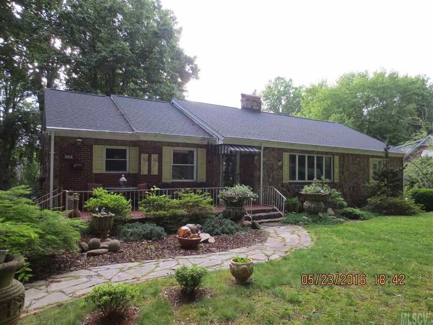 Brick and rock ranch with lots of charm and character.  Tile and hard wood floors, updated kitchen with granite counter tops, stainless steel appliances, fireplace in living room, jack and jill bathroom with pedestal sink, den overlooking deck and backyard.  Two car garage in basement with workshop to the side.  Bonus room and bathroom in basement.  Walk up attic with tons of storage space.  Can possibly be finished.