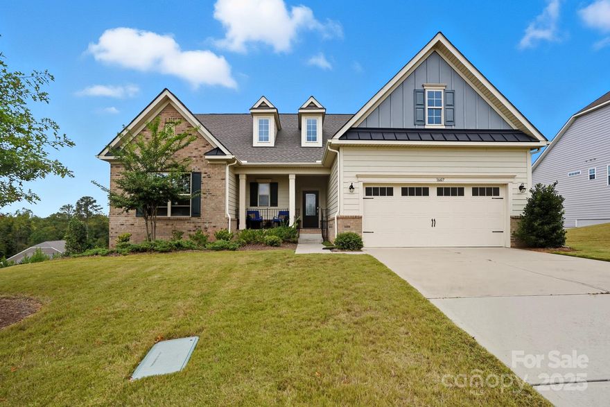 This Beautiful Home & Idyllic Community has everything today’s buyer has been dreaming of! Pristine walking trails w/neighbors walking their dogs, an Abundance of Community Amenities from pickleball to golf to kayak launches into Lake Wylie, and easy commute access to Charlotte’s employment centers.  And a Floorplan in this Lovely Home that is perfect for every lifestyle – for the buyer looking for the ease of one level living w/an amazing primary suite on the main level or for the buyer whose dreamed of building the ultimate 2nd living space then the 2200+ sq ft unfinished basement is a dream come true & a fabulous way to build additional value!  Inside, find light-filled rooms w/ windows that surround, a cozy sunroom to read a good book & a kitchen the gourmet cook in you will love.  This dream kitchen has an abundance of cabinetry, quartz counter tops, extra-large island w/ seating for 4, double ovens & gas cooktop.  And the 2nd level is absolutely perfect for your home office or as a recreation room.  Plus enjoy the 2nd level private guest suite w/ full bath!  Close to shopping, dining, outdoor recreation & more!