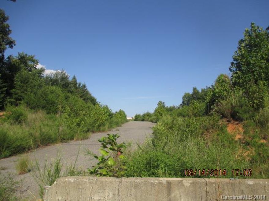 Great Investment Opportunity!  2 parcels total 17.77 acres.  Parcel 213510 (4.48 acres) is zoned RMFCD (Residential Multi Family Conditional District).  Parcel 213509 (13.29 acres) is split zoned RMFCD and RS-12 (Single Family).  City water and sewer are available to both parcels!  This property sold in 2010 for 310,000!