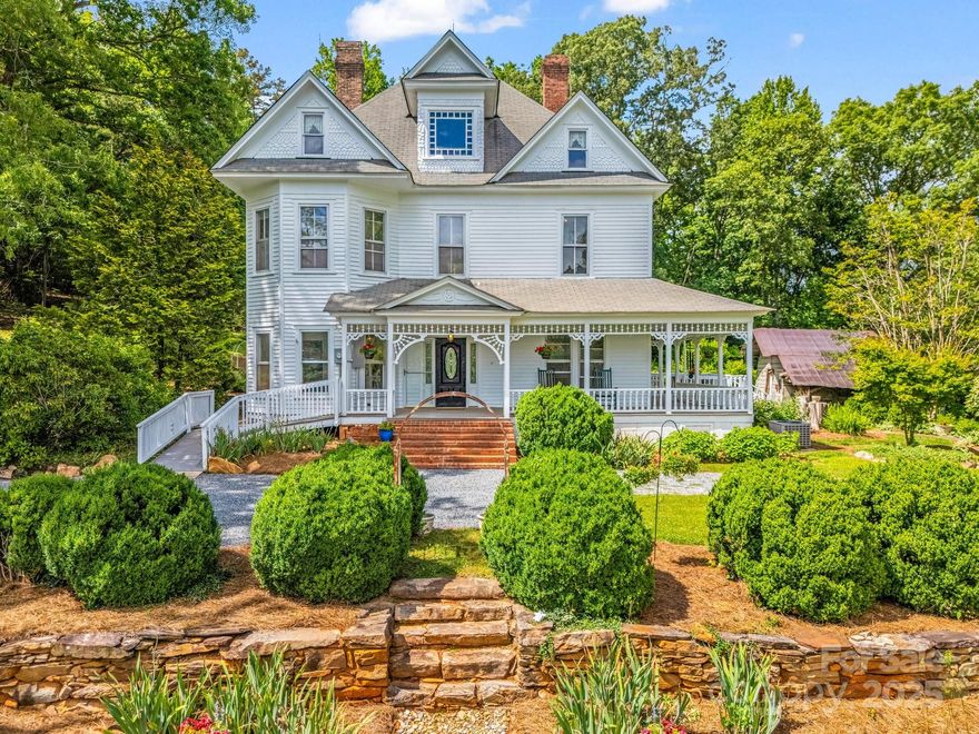 Located only minutes from Rumbling Bald on Lake Lure, this picturesque Victorian style farmhouse sits on over 14 acres which includes multiple building sites, pasture, garden space, green house, and in-ground pool. This unique property is suitable for estate living, farm-to-table restaurant and/or small private inn with some modifications.  The possibilities are endless.  The covered front porch wraps to the side of the house and provides a relaxing area for rocking, enjoying outdoor lunch or sipping tea.  The grounds provide an abundance of opportunities in gardens, lawn games and animal husbandry. Barns and outbuildings could be reimagined as event space, shops, spa space, etc.  A short 4-mile drive to shopping, restaurants and access to Lake Lure.  Airports in Greenville SC, Asheville and Charlotte are all within 1 ½ hours.   As infrastructure is being re-built in Lake Lure, now is a great opportunity to create a lasting legacy.