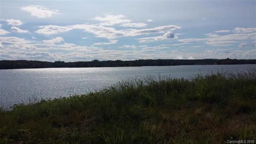 Approximately 380 feet of water frontage on the main channel of Lake Wylie.  This is a point lot with a panoramic view.  Sale includes lot 45 and 44.