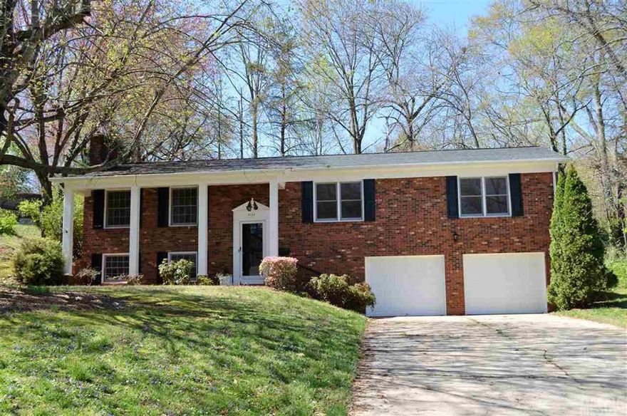 Conveniently located in the Forest Hills community of NW Hickory, this well built, brick home has been recently updated and offers room to grow.  Main level features include a spacious living room w/large windows, well appointed kitchen w/crisp, white cabinetry, new appliances and fixtures, ample overhead and under-counter storage space and large breakfast bar and dining area w/back patio access.  A large master bedroom offers a nicely sized closet and private en-suite bathroom w/tiled shower.  The two secondary bedrooms are spacious and offer hardwood flooring and well appointed closets.  The lower level of the home boasts a large bonus room w/wood burning fireplace, providing a wonderful place to relax or entertain.  The unfinished portion of the basement provides a two-car garage and separate workshop/craft area w/bathroom facility convenient for those working outside.  Located on a large lot w/mature trees and landscaping.  Within walking distance to area parks.
