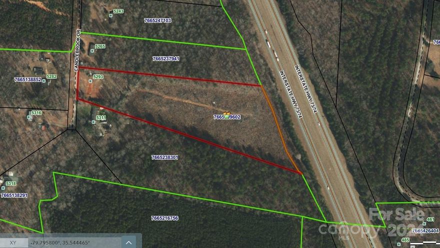 Over 9 acres with well and septic system with pump. Mostly wooded. Located on privately maintained road. Manufactured homes allowed. Lots of potential. Septic system is located with an easement on lot across street. Two wells on property. One is for this lot and the other is on an easement for the home at 5265 Candlebrook.