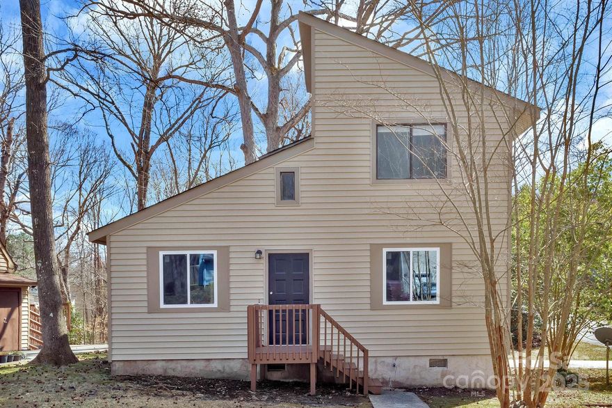 Get the feel of a brand-new home without the brand-new price! This beautiful corner-lot property backs up to serene woods and features an enclosed sunroom—perfect for enjoying the outdoors with indoor comfort. The home boasts a new roof, fresh paint, and new vinyl flooring on the main level, with recently installed carpet upstairs. The updated kitchen adds to the home’s modern appeal, while the private back deck and main-level master bedroom offer convenience and relaxation.

Enjoy an easy commute to Matthews, Mint Hill, and Uptown Charlotte, with restaurants and shopping just a short drive away. The owners have even replaced some windows to ensure minimal maintenance for the next owner. This vacant home is move-in ready for a fast and seamless transition!