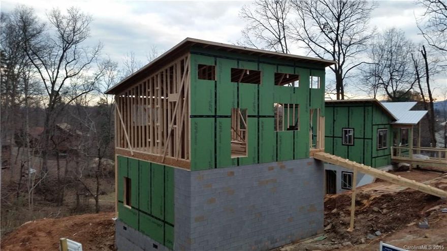 Modern design, Vaulted Ceilings, wide plank hardwood floors, ceramic tub surrounds and floor in bath, granite kitchen, cabinets come with soft close doors and draws, Picture shows similar design with slightly different roof line. See plans for floor plans and outside views. Realtor is builder and owner is family to Realtor.