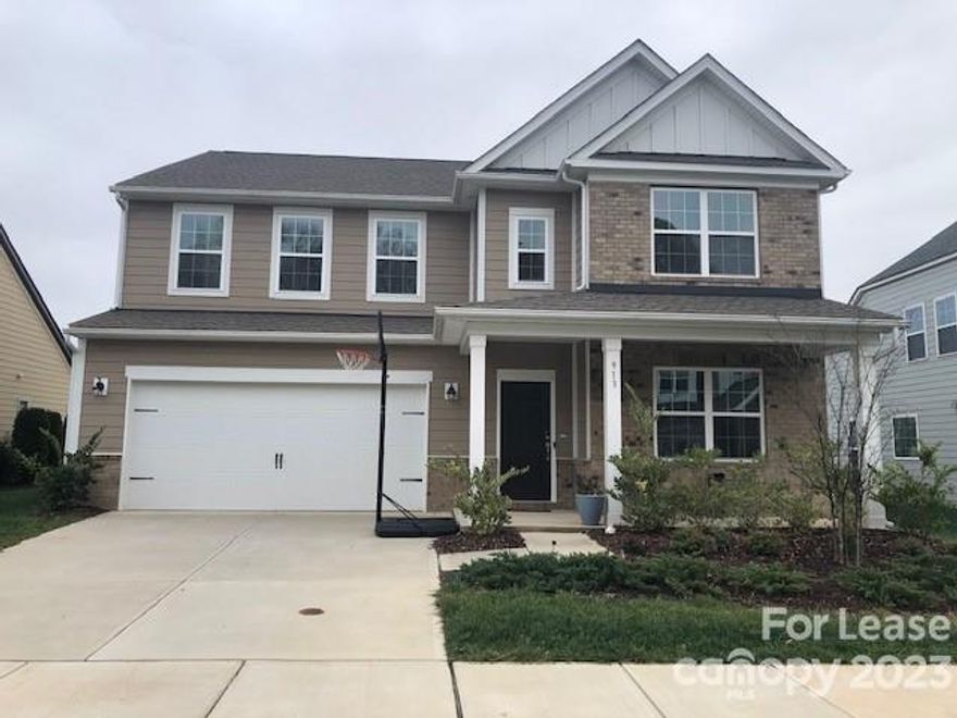 Grand home close to downtown Fort Mill in great school district. The first floor has hardwoods throughout and features an office in the front with french doors. Adjacent is the formal dining room with chair rail and wainscotting around walls. The kitchen has granite countertops, top of the line SS appliances, and a long breakfast bar. The great room features a gas log fireplace and is open to the breakfast room with sliding door access to the backyard which has a paved patio and built in outdoor grill with stone surrounding and countertop. There is a main floor guest bedroom with a full bathroom right next door. Upstairs are 3 guest bedrooms each with a walk in closet and share a hall bath with dual sinks as well as a HUGE loft. The master bedroom is oversized with a large walk in closet, and an en suite bathroom with dual sinks, walk in shower, and separate garden tub. Washer/dryer is included in the laundry room upstairs. extended 2 car garage.option to have it furnished $3250.