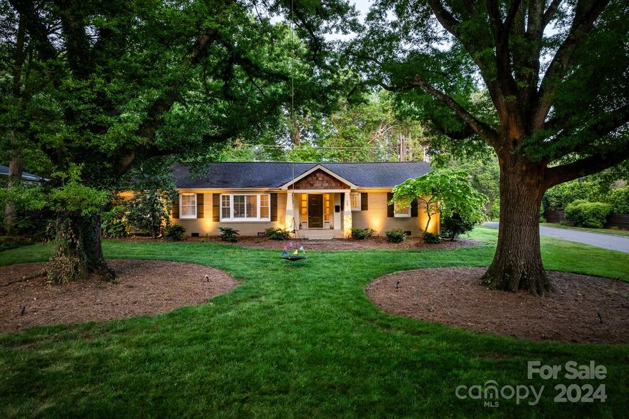 Nestled on a corner lot, lined with mature trees, this tranquil home offers a peaceful escape in the heart of the city. The floor plan flows beautifully from room to room, all centered around the fenced courtyard, bringing nature into the very essence of the property. Large primary suite boasts a custom closet and serene bathroom with dual vanities, garden tub and shower. Additional features of note include neutral paint throughout, gorgeous hardwood flooring, abundant natural lighting, stainless steel appliances and updated finishes. Outdoor living spaces includes screened porch, fenced courtyard and sprawling, flat yard surrounded by plush greenery, plus an oversized playhouse with electricity. Welcome to your Sherwood Forest dream home.