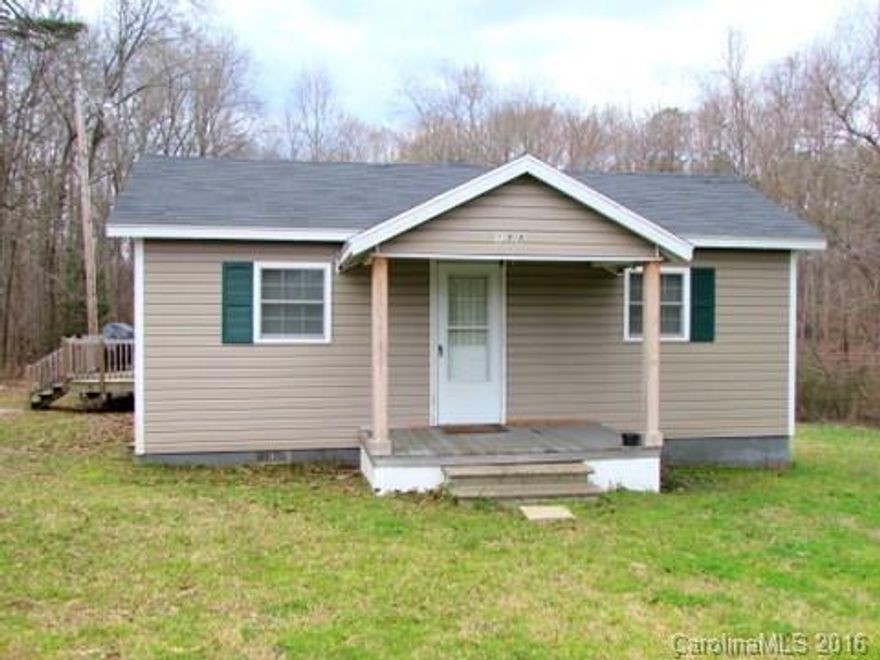 Adorable 2BR/1BA older home that is completely move in ready. Home offers open living room to kitchen and dining, spacious laundry room, new roof 2013, new HVAC installed 2015 and beautiful laminate flooring. Enjoy 1.6 ACRES on the large deck or sitting by a bonfire on a chilly night. Don't miss out on this one!!!