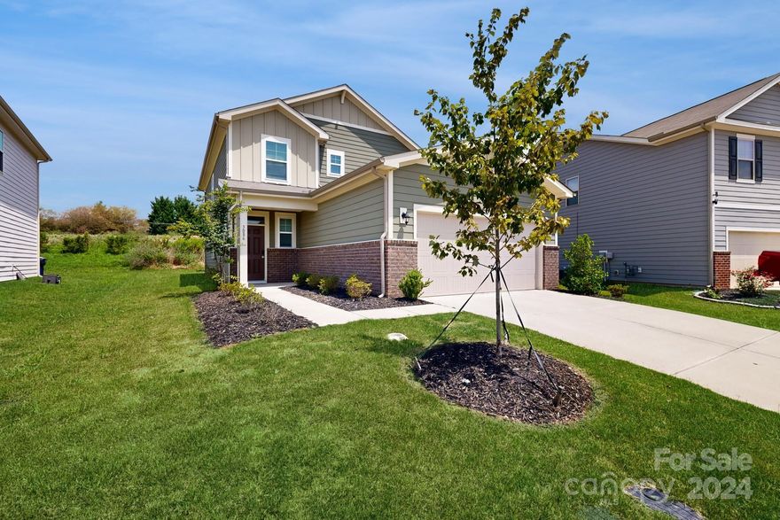 Welcome home! This 4 bedroom, 2.5 bath home offers stress-free living nestled within a vibrant community. Step into open-concept main floor living where the spaciousness of the layout invites both comfort and style. The heart of the home is the chef's gourmet kitchen with 36" cabinets, tile backsplash, gleaming granite countertops, a stainless steel appliance package, and a large island that overlooks the great room. Your new home features a first-floor primary suite w/ walk-in shower, luxury vinyl plank flooring throughout the foyer, powder room, dining area, great room, and kitchen. Upstairs, you'll find three additional bedrooms, a full bathroom, closets galore, and a versatile loft space. When adventure beckons, Wesley Chapel Village and Sun Valley Commons are just minutes away, offering shopping and dining options.