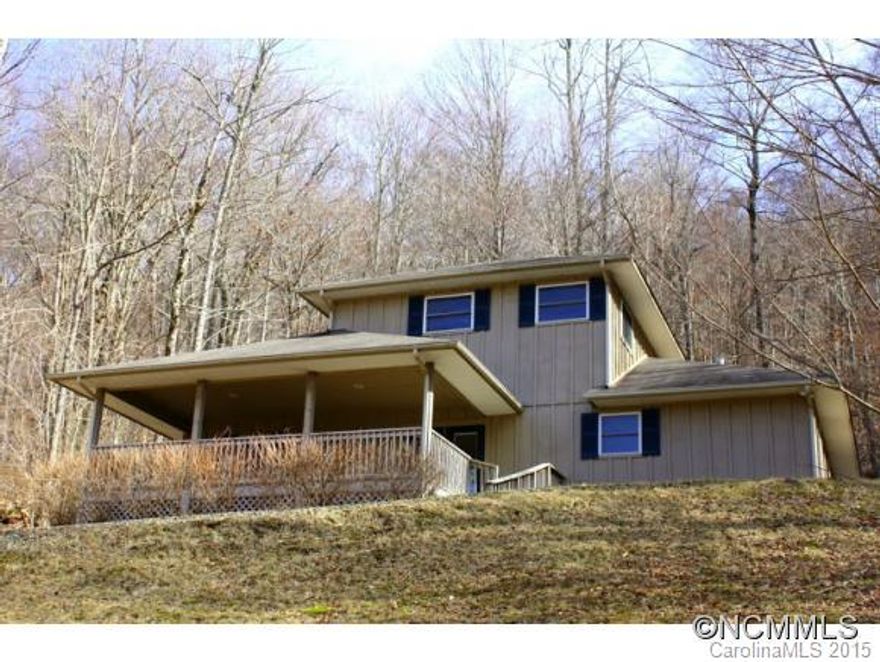 Neat as a pin, Contemporary/Cottage Styling, 2 Levels, 2 BR, 2.5 BA with a BR Suite on each level, Single Garage with direct entry to the home, 1,476 SF, Circular Driveway, Small Side Creek, Gentle Slope, Easy Driveway, Just off paved road for great year round access, Lots of Closet Space, eg, 2 very Ample Closets in each BR, Across the street from Golf Course, Conveys Fully Furnished, Board and batten Exterior, Covered Deck, Mature Landscaping