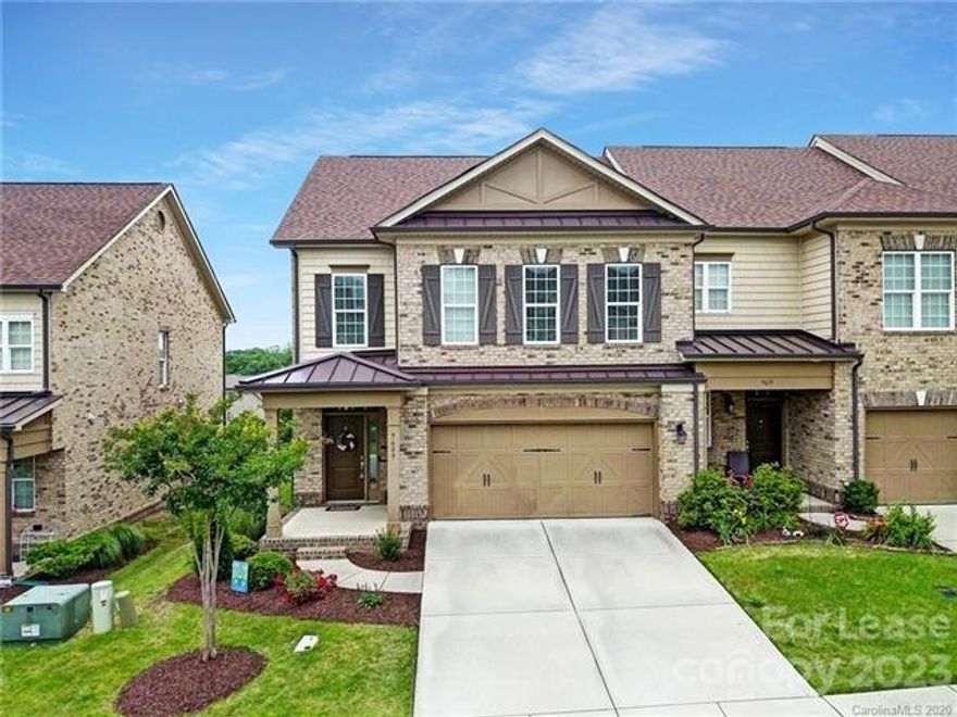 Beautiful Brick Townhome in sought after Christenbury Walk! Open floorplan with spacious great room with corner fireplace and coffered ceiling open to the gourmet kitchen featuring cream cabinetry, beautiful granite and a black GE appliance Package. Kitchen features eat in bar area and drop zone with cabinets. Hardwoods in foyer, kitchen and powder room. Second floor features a spacious master bedroom with a large sitting area and trey ceiling. Primary bathroom has separate raised vanities, two large walk in closets. Spacious secondary bedrooms, one of which has hardwood flooring. Loft is a great flex space. Laundry conveniently located on the second floor. Neighborhood has Clubhouse, Tennis, Resort Pool, Playground, Fitness Room and lots of entertaining space.