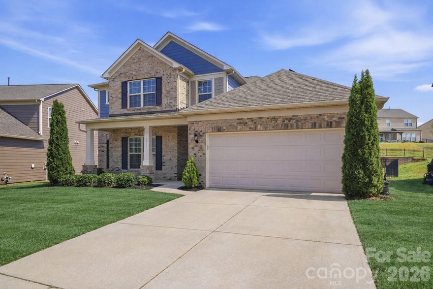 Welcome home to this beautifully maintained home in the Chapel Cove community, where timeless curb appeal meets modern comfort and energy efficiency. A charming rocking-chair front porch sets the tone, inviting you into a bright, open interior filled with natural light and thoughtfully designed living spaces.

This versatile 4-bedroom, 2.5-bath floor plan offers flexibility on both levels to suit your lifestyle. The spacious front room can easily function as a home office (current use), formal dining area, or playroom. The heart of the home features a well-appointed kitchen and breakfast area with stainless steel appliances, granite countertops, and a stylish backsplash, all seamlessly connected to the main living spaces for effortless entertaining.

A highly functional drop zone, computer niche, and laundry area create an ideal everyday command center just off the kitchen and garage. The primary suite, conveniently located on the main level, offers a private retreat with generous space and comfort. Upstairs, you’ll find three additional bedrooms—all with walk-in closets—along with a spacious loft perfect for a media room, second living area, or workspace. Contemporary open stair railings add a modern architectural touch that enhances the home’s overall design.

Step outside to enjoy a well-maintained, fenced backyard with a covered patio—perfect for relaxing or hosting gatherings year-round. As an added bonus, solar roof panels help significantly reduce energy costs, offering both sustainability and savings.

Chapel Cove residents enjoy resort-style amenities including a clubhouse, pool, pickleball and tennis courts, sport court, playground, walking trails, fitness center, and a paddlesport launch area. With convenient access to Lake Wylie and nearby dry and wet dock storage, plus an easy commute to Uptown Charlotte and under 25 minutes to Charlotte Douglas International Airport, this home offers the perfect blend of lifestyle and location.