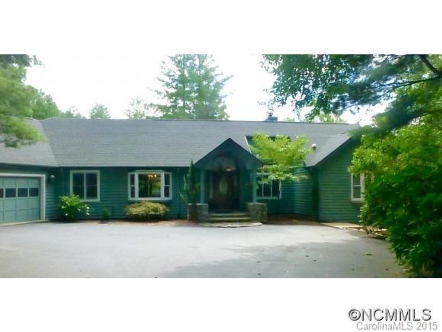 Imagine the Blue Ridge mountains of Western North Carolina. Now imagine a home w/over 380 feet of waterfront nestled in the community of Flat Rock Lakes. The Flat Rock Playhouse & Carl Sandberg's National Historic Site are but 2 miles down the road. Home has two Master Suites on the main floor & Guest Suite at lake level. 800 SQ. FT. cedar deck looks over the lake, which is private residential lake. New granite, new cabinets, MUST SEE PROPERTY!